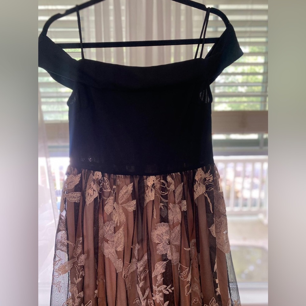 Beautiful evening dress. Perfect for weddings or any special occasion.